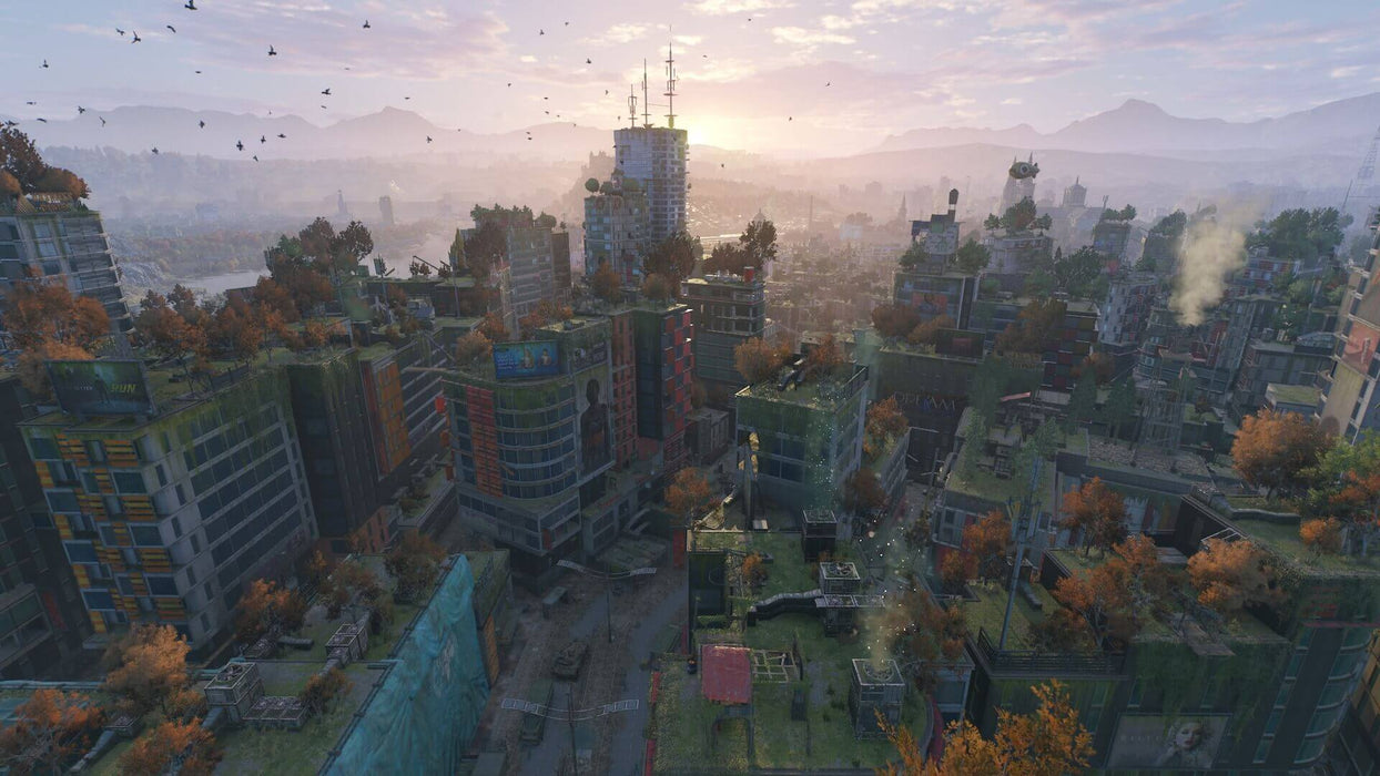 Gameplay screenshot - Breathtaking aerial view of the post-apocalyptic city in Dying Light 2: Stay Human on Xbox. The overgrown skyscrapers, ruined streets, and golden sunset create an immersive open-world environment. Buy your Dying Light 2 Xbox One & Series X key now at RushGame.co for an instant digital download