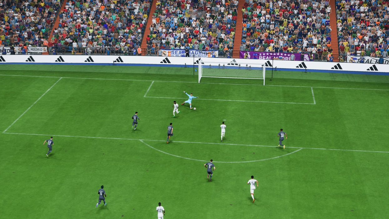 Game screen - EA Sports FC 24 match scene showing a thrilling goal-scoring opportunity, with the goalkeeper rushing out to stop the ball. Experience next-level football realism by purchasing your Xbox digital key at RushGame.co