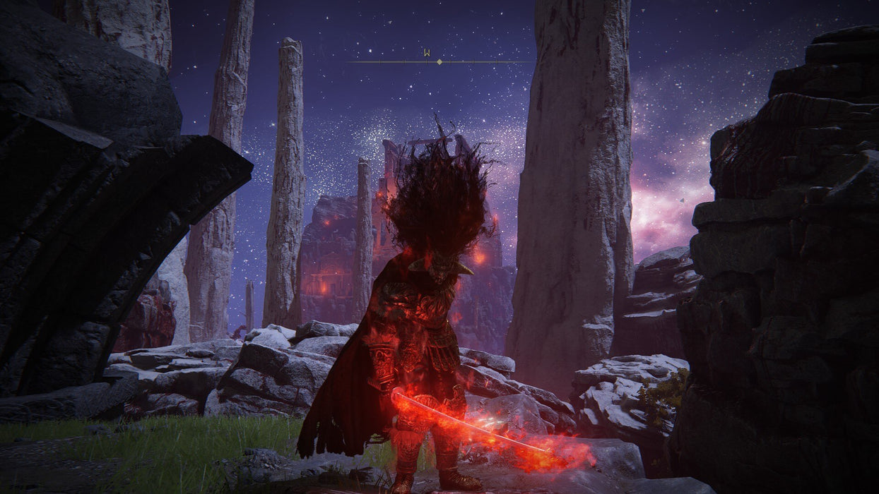 Gameplay Screenshot - A cursed warrior engulfed in dark flames wields a glowing red sword in Elden Ring: Shadow of the Erdtree DLC on Xbox, standing beneath a cosmic night sky with burning ruins in the distance. Purchase your digital key instantly at RushGame.co