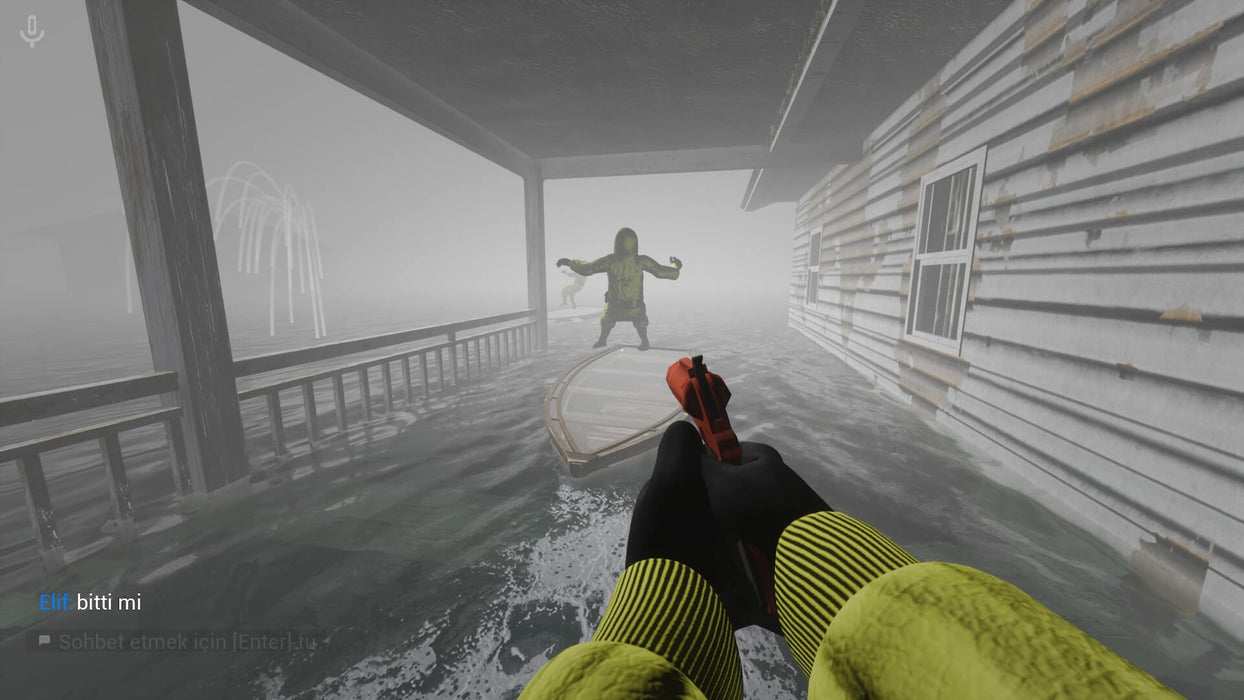 In-game screenshot - Escape the Backrooms PC Steam horror gameplay as a player in a hazmat suit encounters a humanoid creature on a fog-covered porch. The player's perspective shows a red flare gun aimed at the approaching entity. Buy your Escape the Backrooms PC Steam digital key now at RushGame.co and escape the lurking horrors
