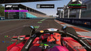 F1 24 in-game screenshot featuring a Ferrari Formula 1 car crossing the finish line, with the "Chequered Flag" banner displayed. The race lap counter shows 29/29, indicating the final lap of the competition. Get your F1 24 Xbox One & Xbox Series X|S CD Key at RushGame.co and race to victory
