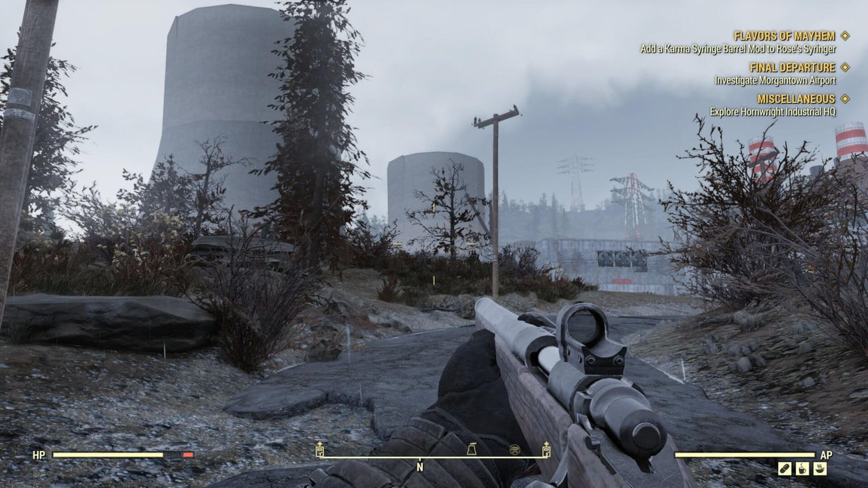 Gameplay screen - A first-person perspective in Fallout 76 shows a player aiming a scoped rifle at an abandoned industrial site with towering cooling towers and a foggy sky. Experience cooperative survival in an open-world RPG with Fallout 76 PC Steam CD Key, available now at RushGame.co