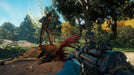 Far Cry: New Dawn gameplay - player encountering a fallen moose in a dense forest – A first-person view of a player holding a rifle, facing a fallen moose while an NPC character stands nearby in a lush, overgrown forest. Buy Far Cry: New Dawn for Xbox One now at RushGame.co
