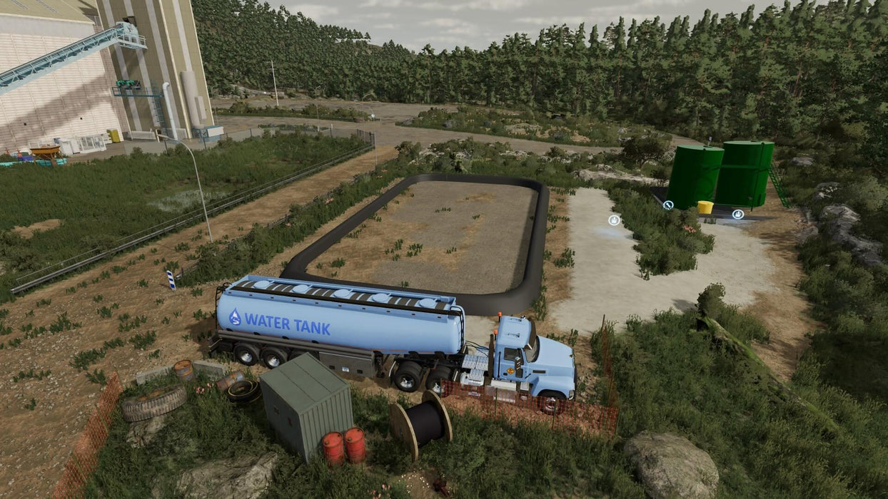 Farming Simulator 22 - Xbox One & Series X/S In-Game Screenshot -Gameplay shot of Farming Simulator 22 on Xbox, featuring a large water tanker truck parked near an agricultural processing facility. Get your Xbox digital key now at RushGame.co