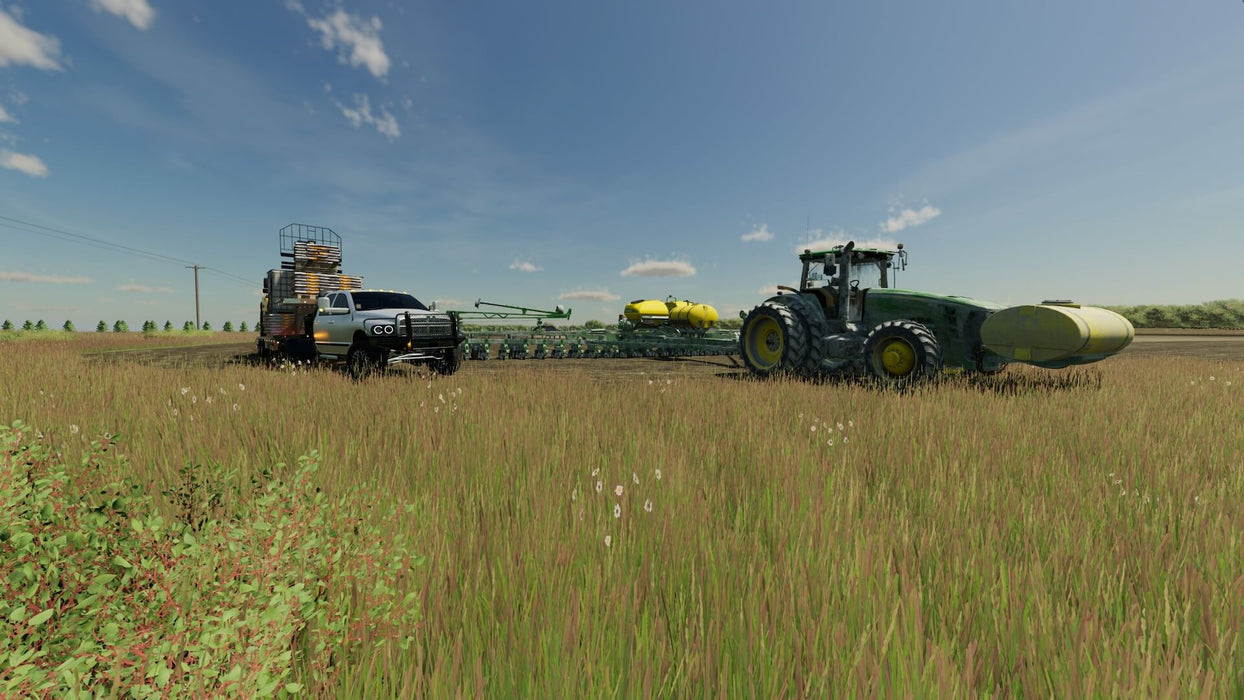 Farming Simulator 22 - Xbox One & Series X/S In-Game Screenshot - A high-performance John Deere tractor working on a vast open field in Farming Simulator 22 for Xbox One & Series X/S. Purchase your Xbox game key instantly at RushGame.co