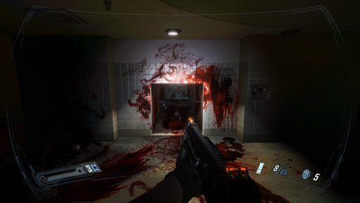 Gameplay screenshot - Horror-filled moment in F.E.A.R. 2: Project Origin on PC Steam, where the player faces a blood-covered air vent with eerie messages scrawled on the wall. Get your digital game key today at RushGame.co