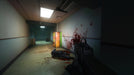 Gameplay screenshot - A terrifying corridor in F.E.A.R. 2: Project Origin for PC Steam, with blood splattered on the walls and a fallen soldier lying near a vending machine, hinting at supernatural horror. Secure your activation key now at RushGame.co