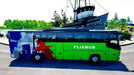 Gameplay screen - FlixBus with a French-themed design-
A FlixBus decorated with a blue, white, and red French-themed design, driving through a coastal area in Fernbus Simulator - France DLC. Enjoy immersive coach simulation—buy your Steam CD Key now at RushGame.co