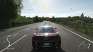 Gameplay screenshot - A red Ford Mustang GT drives through the scenic countryside in Forza Horizon 4 Standard Edition. Explore open-world landscapes and thrilling road trips. Buy your Xbox One or Windows 10 CD key now at RushGame.co