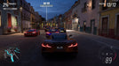 Gameplay screenshot - An intense night street race in Forza Horizon 5 Premium Add-Ons Bundle DLC, featuring high-performance sports cars racing through the neon-lit streets of Mexico. Purchase your digital code at RushGame.co and dominate the Horizon Festival