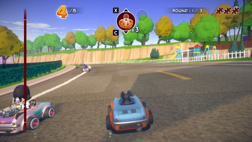 Gameplay screenshot - Kart racing excitement in Garfield Kart: Furious Racing on PC Steam, showing a high-speed battle near a suburban playground. Purchase your Steam CD Key at RushGame.co and join the competitive fun