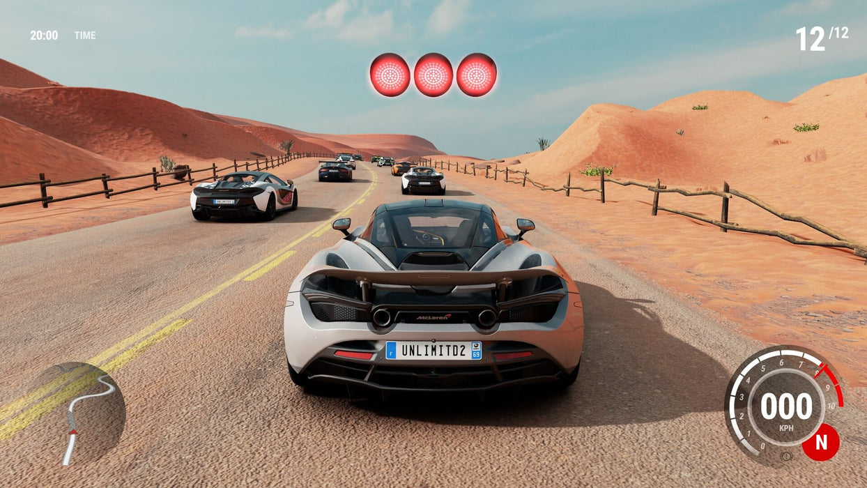 Gear.Club Unlimited 2 Ultimate Edition gameplay screenshot showing a McLaren supercar at the starting line of a desert race with multiple opponents. The race countdown lights indicate the action is about to begin. Buy your Gear.Club Unlimited 2 Ultimate Edition PC Steam CD Key at RushGame.co and dominate the tracks