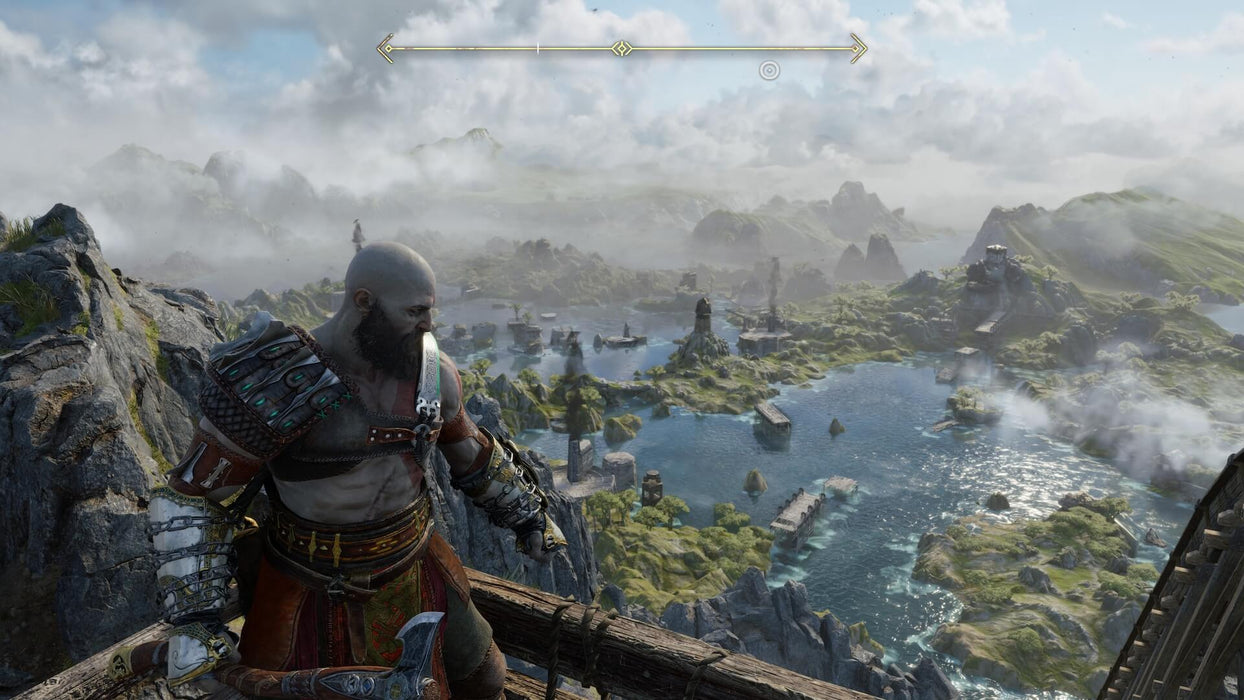 Gameplay screenshot - Kratos stands on a cliffside overlooking a vast, misty Nordic landscape in God of War Ragnarök on PS5. Discover an immersive world of gods and monsters—get your Deluxe Edition CD Key at RushGame.co