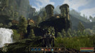 Gameplay screenshot - Gothic 3 PC Steam in-game screenshot featuring a breathtaking view of a fortified castle atop a hill, surrounded by lush greenery and waterfalls. Buy your Gothic 3 PC Steam CD Key at RushGame.co and explore a vast open world filled with quests and adventure.