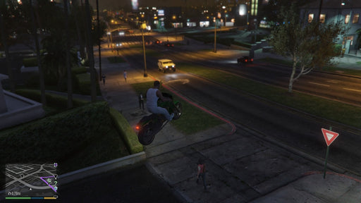 A dramatic nighttime action scene from GTA V, featuring a biker mid-air after launching off a ramp in the city streets. Perform insane stunts and explore Los Santos—buy your GTA V Rockstar Social Club CD Key at RushGame.co today