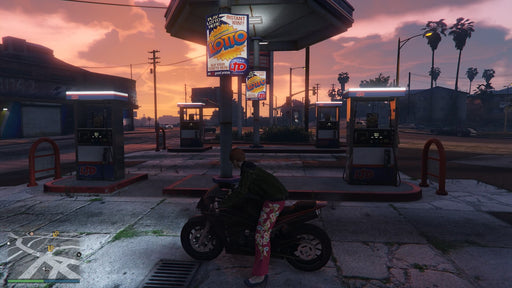 Gameplay screenshot - A biker stops at a gas station in Los Santos at sunset in Grand Theft Auto V for Xbox One. Fuel up and prepare for your next high-speed getaway—buy your GTA V Xbox One CD Key US now at RushGame.co