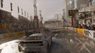 Gameplay screenshot - Dramatic start to a rainy race in GRID Legends, as cars line up on a wet track with spectators watching. Purchase your GRID Legends Xbox digital key at RushGame.co