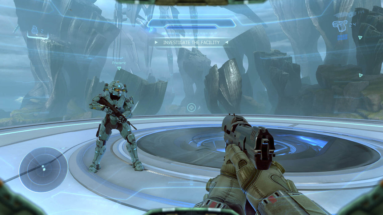 Gameplay screenshot - A first-person view from Halo 5: Guardians showcasing a Spartan interacting with a squad member in a high-tech alien environment. Unlock the full experience with a digital Xbox key from RushGame.co