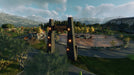 In-game screenshot from Jurassic World Evolution 2 on Xbox, showcasing the iconic Jurassic Park entrance surrounded by beautiful scenery. Get your Xbox One or Series X|S digital key for Jurassic World Evolution 2 (EU) at RushGame.co