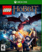 Cover art for LEGO The Hobbit on Xbox One, showing LEGO versions of Bilbo Baggins, Gandalf, Thorin, and Legolas facing the fiery dragon Smaug. Get your Xbox One CD Key US now at RushGame.co and embark on an epic Middle-earth adventure with instant digital delivery