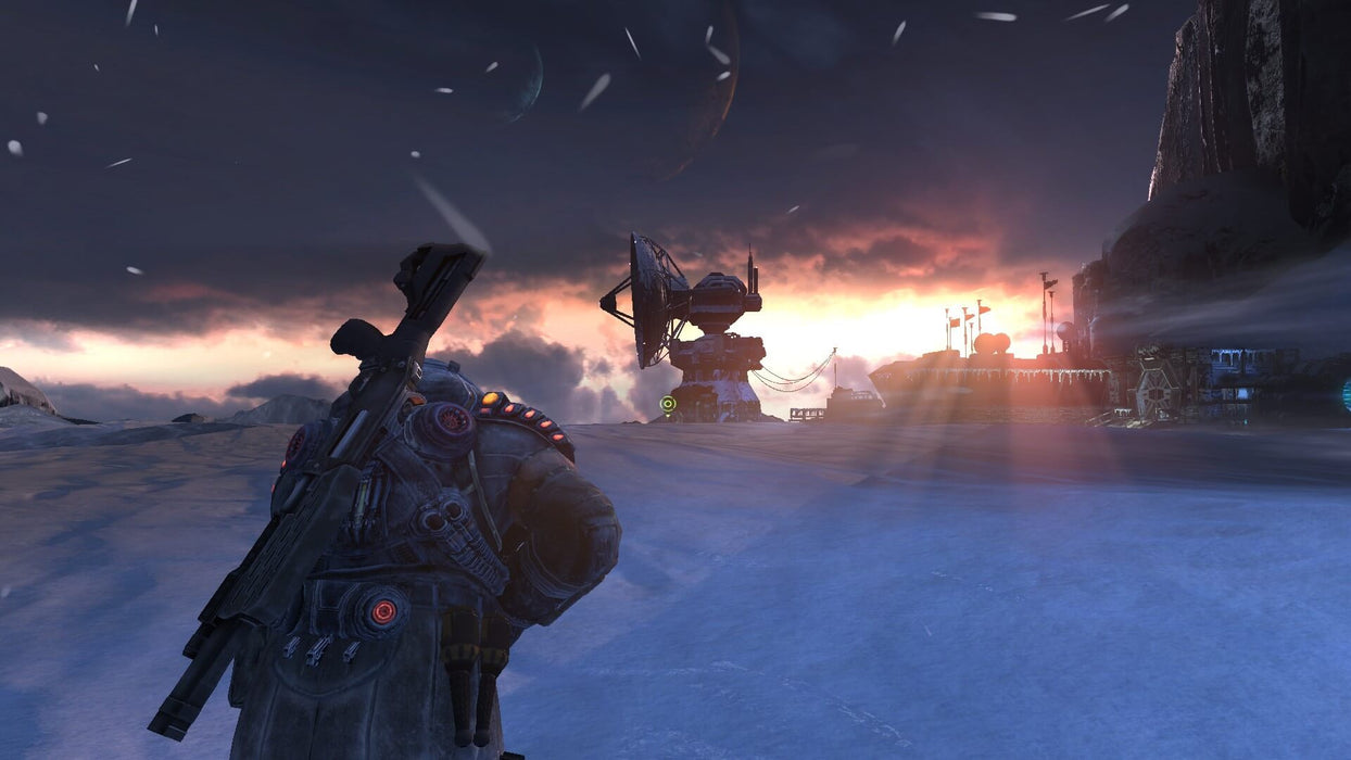 Lost Planet 3 Complete Pack PC steam key, screenshot depicting the protagonist walking through a snowy environment with a satellite dish in the distance.