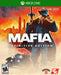 Cover art for Mafia: Definitive Edition on Xbox One, featuring a mobster in a suit holding a tommy gun with a vintage car and a fiery city skyline in the background. Buy your Mafia: Definitive Edition Xbox One CD Key US now at RushGame.co for an immersive 4K remastered crime experience
