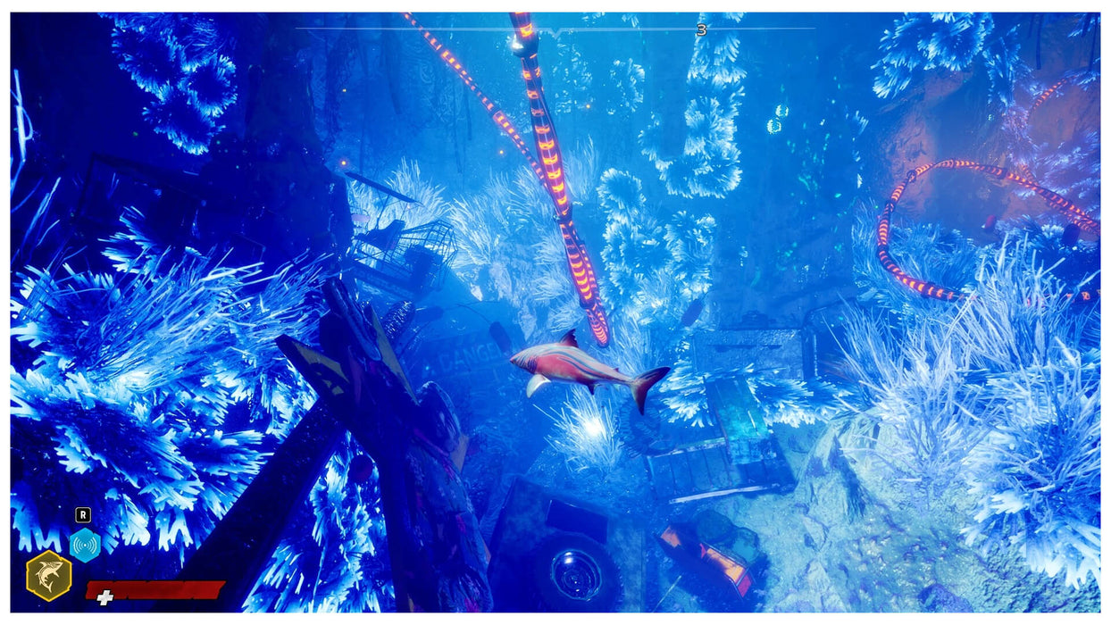 Gameplay image of Maneater Apex Edition featuring a shark swimming through a vibrant coral reef surrounded by sunken items and electric decorations. Experience the apex predator journey—buy your game key today at RushGame.co
