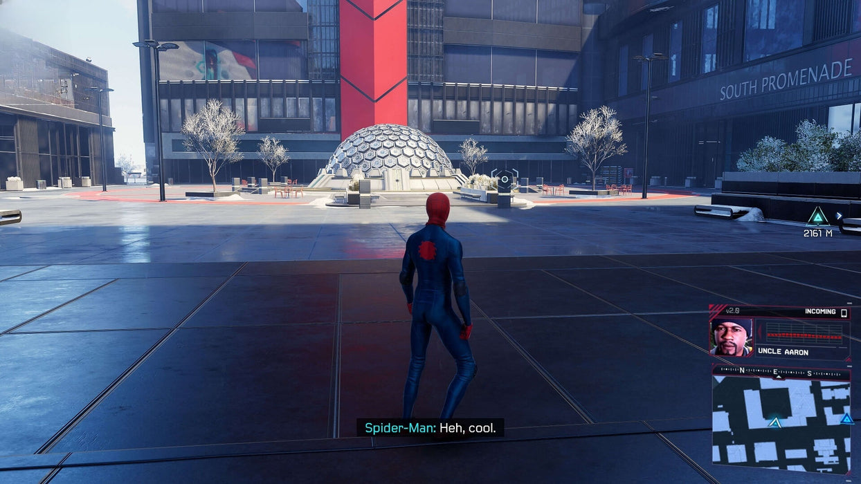 Miles Morales stands in front of a futuristic dome with dialogue on screen in 'Marvel's Spider-Man: Miles Morales' PC Steam version. Available for purchase at RushGame.co.