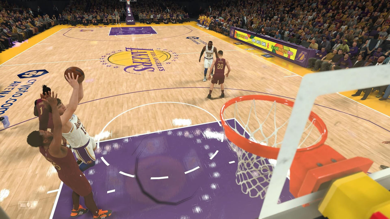 NBA 2K24 PC Steam showing a player from the Lakers making a layup - A dynamic screenshot from NBA 2K24 where a Lakers player attempts a layup in the heat of the game. The court-side view and realistic crowd bring the NBA experience to life on PC. Get your NBA 2K24 Steam key now from RushGame.co for the ultimate basketball simulation