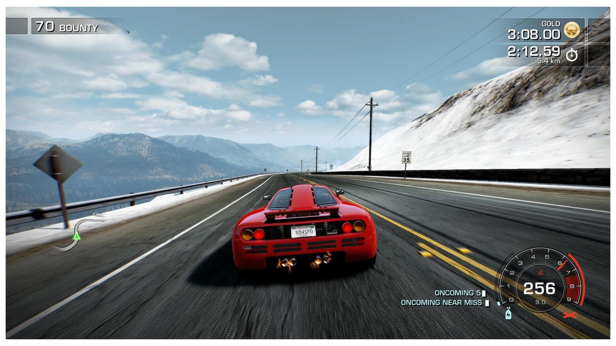 Red McLaren F1 racing at top speed through snowy mountain roads in Need for Speed Hot Pursuit. Purchase your PC EA Play CD key now at RushGame.co