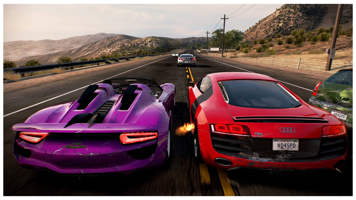 Porsche 918 Spyder and Audi R8 in a close duel on a desert highway in NFS Hot Pursuit Remastered. Secure your Nintendo Switch CD Key for the North American region at RushGame.co