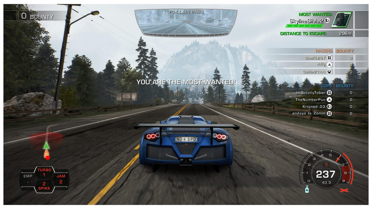 Scene from Need for Speed: Hot Pursuit Remastered where the player in a blue Pagani Zonda Cinque becomes the most wanted racer. Unlock the full experience with a PC EA Play key from RushGame.co