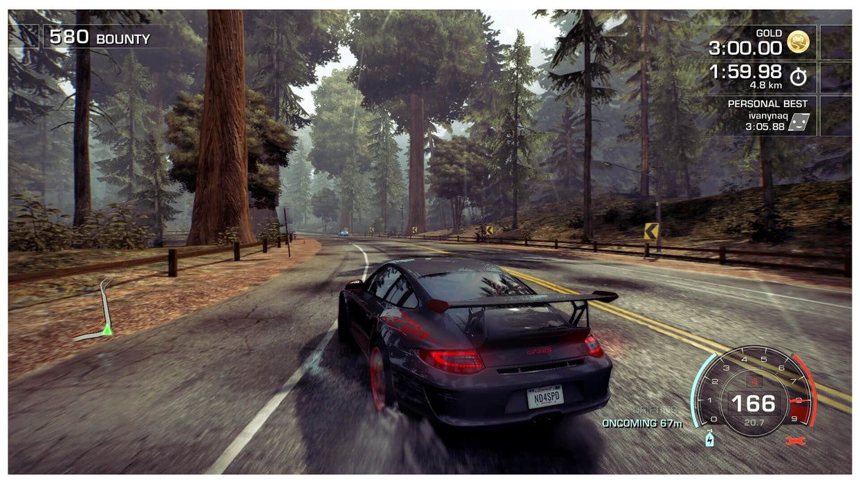 A Porsche GT2 RS tearing through a forest highway in Need for Speed: Hot Pursuit Remastered on Xbox One. Experience heart-pounding pursuits—buy your digital game key now at RushGame.co