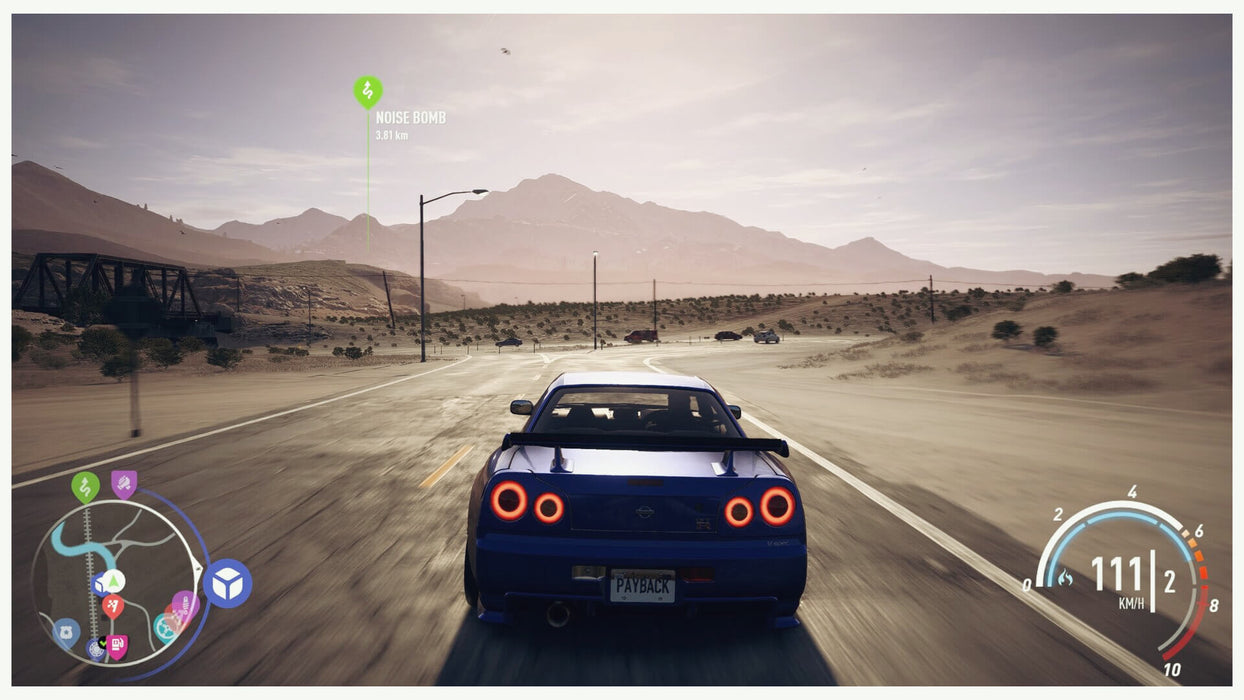 Blue Nissan Skyline driving toward the mountain horizon in Need for Speed: Payback on Xbox. Epic open-world racing adventure – CD key at RushGame.co