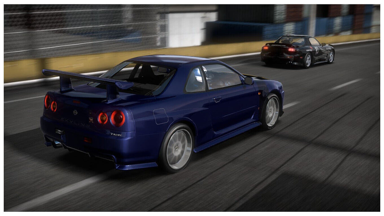 In-game screenshot from Need For Speed Shift showing a blue Nissan Skyline R34 racing at full speed. Get your PC Origin CD Key for NFS Shift today at RushGame.co