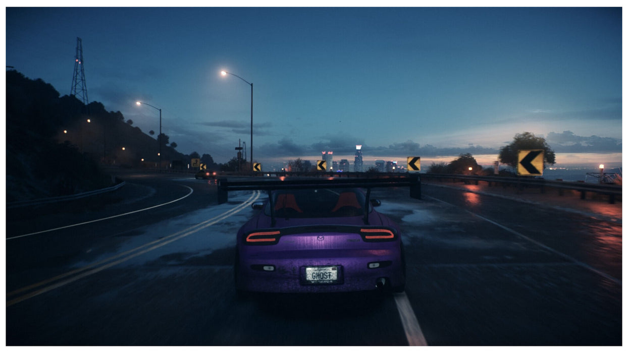 Night racing scene in Need for Speed on Xbox One with a custom Mazda RX-7 on a wet highway, city lights in the background – get your Xbox One CD key instantly from RushGame.co