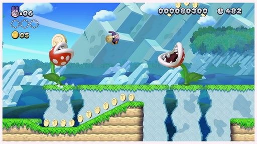 Action-packed scene from New Super Mario Bros. U Deluxe for Switch, showing a player dodging giant Piranha Plants and collecting coins in a side-scrolling level – available now as a US digital key at RushGame.co