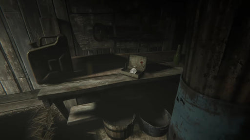 In-game screenshot from Outlast 2 showing a dark wooden shed with a first aid kit and gas canister on a bench – explore terrifying survival moments with a Steam key from RushGame.co