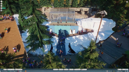Gameplay from Planet Zoo: Aquatic Pack showcasing an arctic penguin habitat surrounded by visitors and forest pathways. Experience advanced zoo simulation with a Steam CD Key from RushGame.co