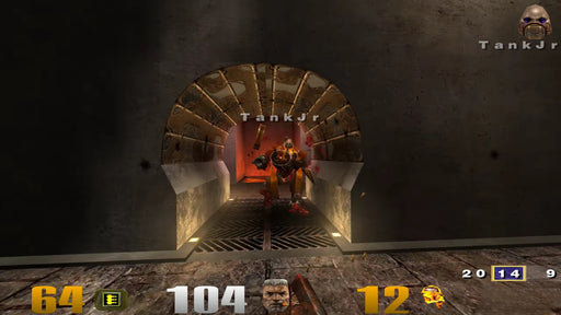 In-game screenshot from Quake III: Gold on PC, showing the character TankJr emerging from a tunnel under fire. Buy your digital game key at RushGame.co and join the arena action today