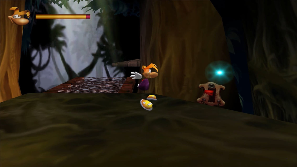 In-game scene from Rayman 2: The Great Escape for PC GOG, depicting Rayman standing near a glowing energy orb in a dark forest — get your digital copy now at RushGame.co