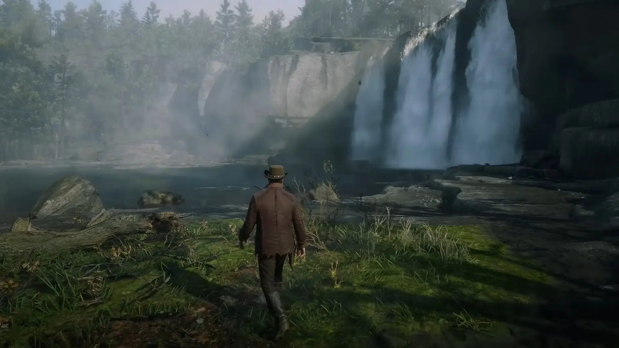 Player explores a misty forest area with a powerful waterfall in Red Dead Redemption 2. Enhance your adventure with the Rockstar Social CD Key from RushGame.co