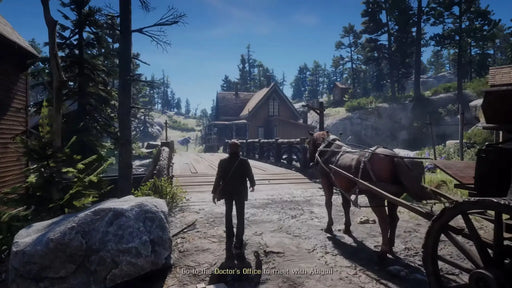 Scene from Red Dead Redemption 2 for Xbox where the player walks towards a wooden house with a horse carriage nearby, set in a peaceful forest area. Get your Xbox Series X|S key instantly at RushGame.co