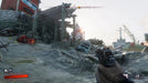 In-game scene from Redfall on PC showing the player exploring a rocky coastal dock area at sunrise with a pistol drawn. Get your digital download Steam key from RushGame.co and uncover the secrets of Redfall