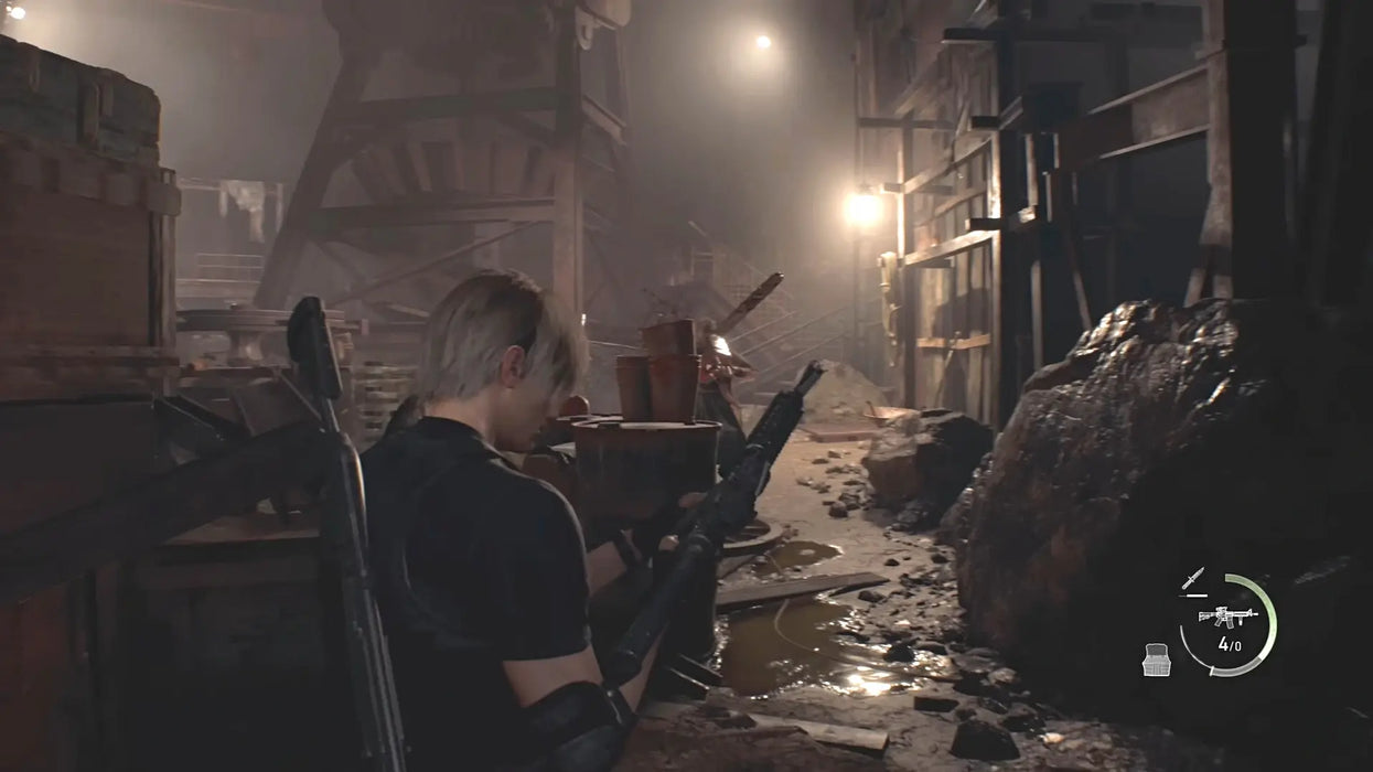 Leon S. Kennedy prepares his rifle in a dark industrial area lit by scattered lights and debris in Resident Evil 4 (2023). Buy the PC Steam CD Key now at RushGame.co and face the horror head-on