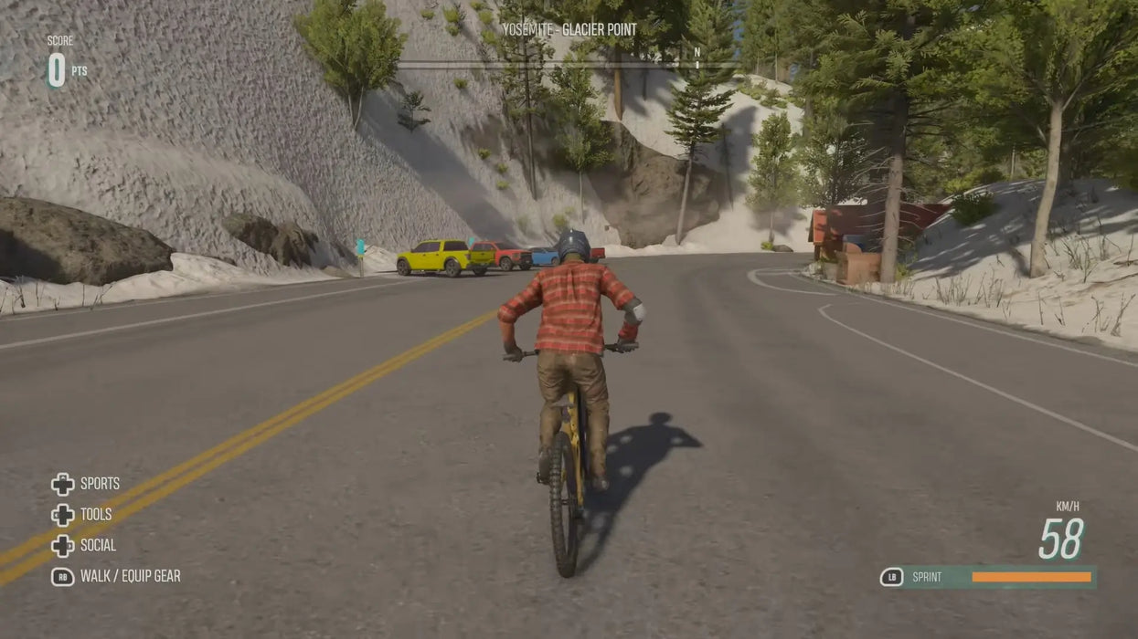 Exciting Riders Republic gameplay screenshot featuring downhill cycling near Yosemite's Glacier Point, detailed environment, and immersive visuals. Buy your DLC Xbox game key at RushGame.co