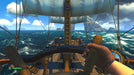 Gameplay image of Sea of Thieves featuring a first-person perspective at the ship’s wheel, navigating the ocean waves with clear blue skies. Unlock Sea of Thieves for Default Title or PC with a digital CD key from RushGame.co and become the captain of your pirate crew today.