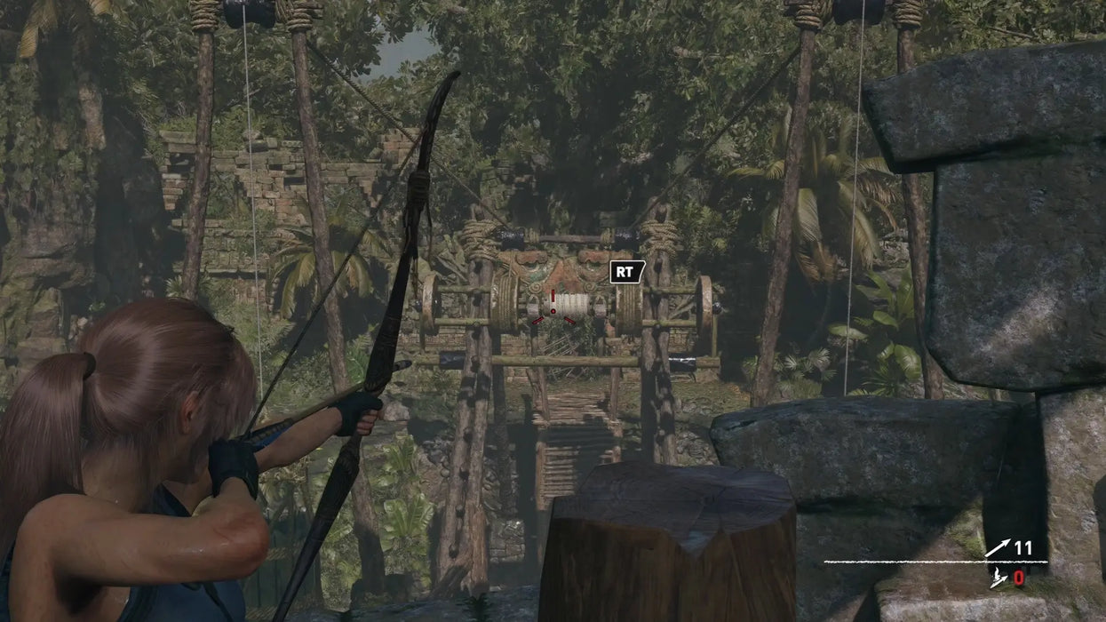Shadow of the Tomb Raider Definitive Edition gameplay image with Lara Croft aiming a bow at an ancient mechanism. Unlock the adventure with a Steam Key from RushGame.co – your source for instant digital codes