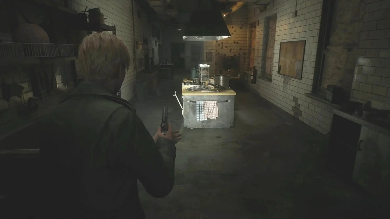 In-game screenshot from SILENT HILL 2 on Steam showing the main character exploring a dark, atmospheric kitchen with a handgun—unlock this survival horror adventure with a Steam key from RushGame.co for instant code delivery