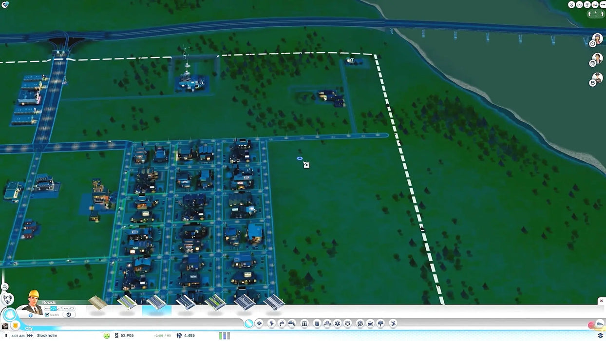 Gameplay screenshot from SimCity Complete Edition showing a grid layout of city buildings and residential areas at night, with power and utility overlays. Purchase a SimCity Complete Edition Origin key from RushGame.co for instant access and start building your dream city